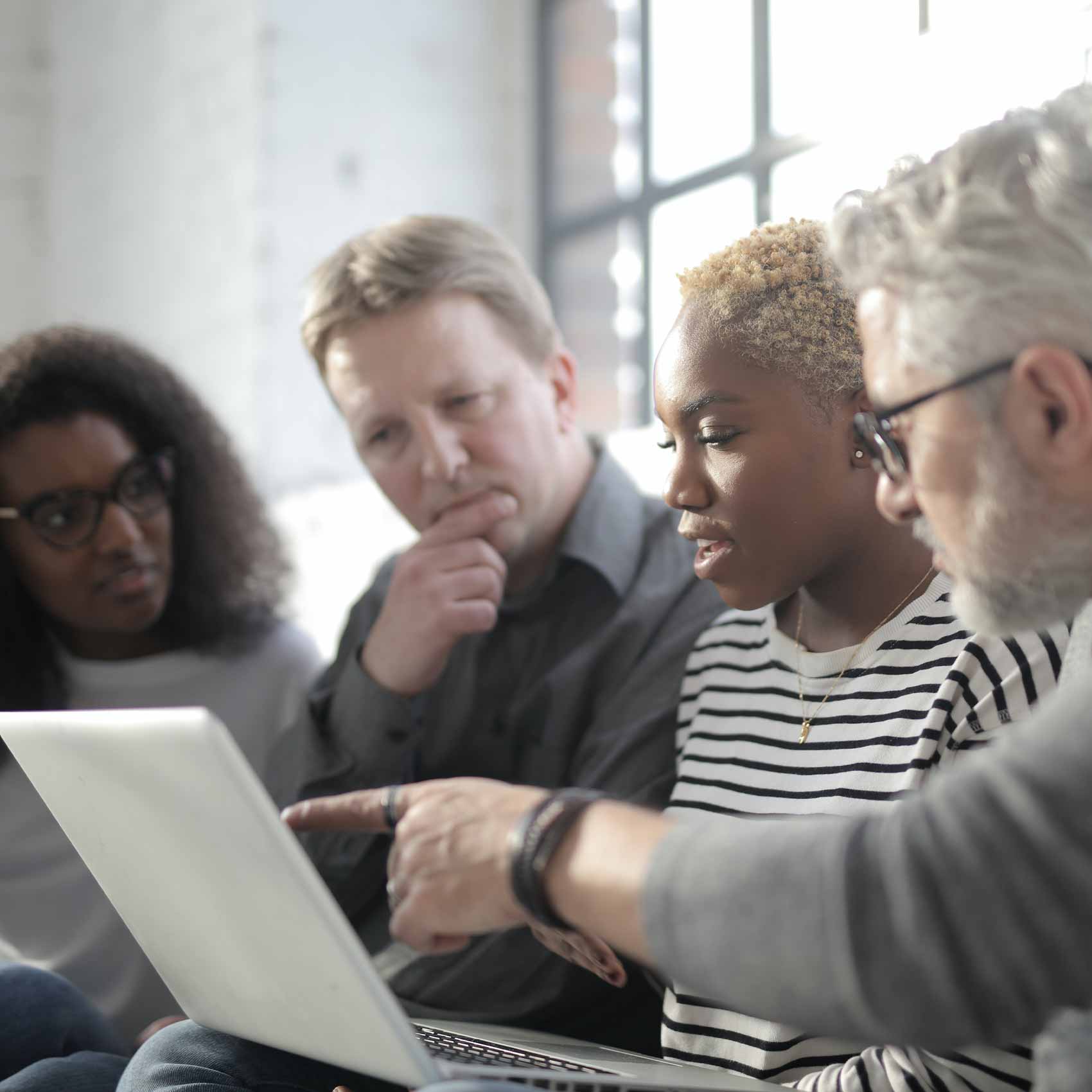 A group of local business owners searching Bookkeeper vs. QuickBooks on their computer. A group of local business owners searching Bookkeeper vs. QuickBooks on their computer.